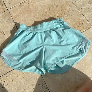 Lululemon hotty hot low rise 4in shorts. Color icing blue